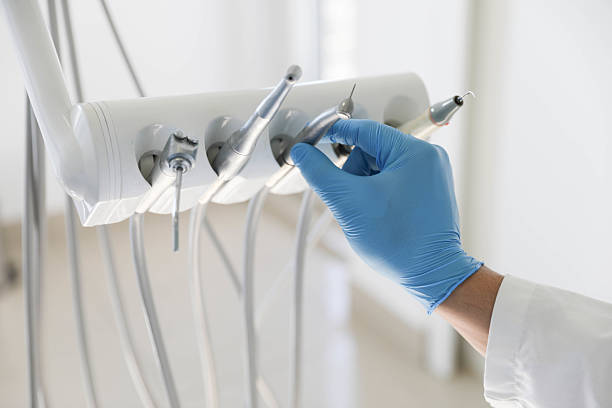 Professional Emergency Dentist technician working in Tampa, FL